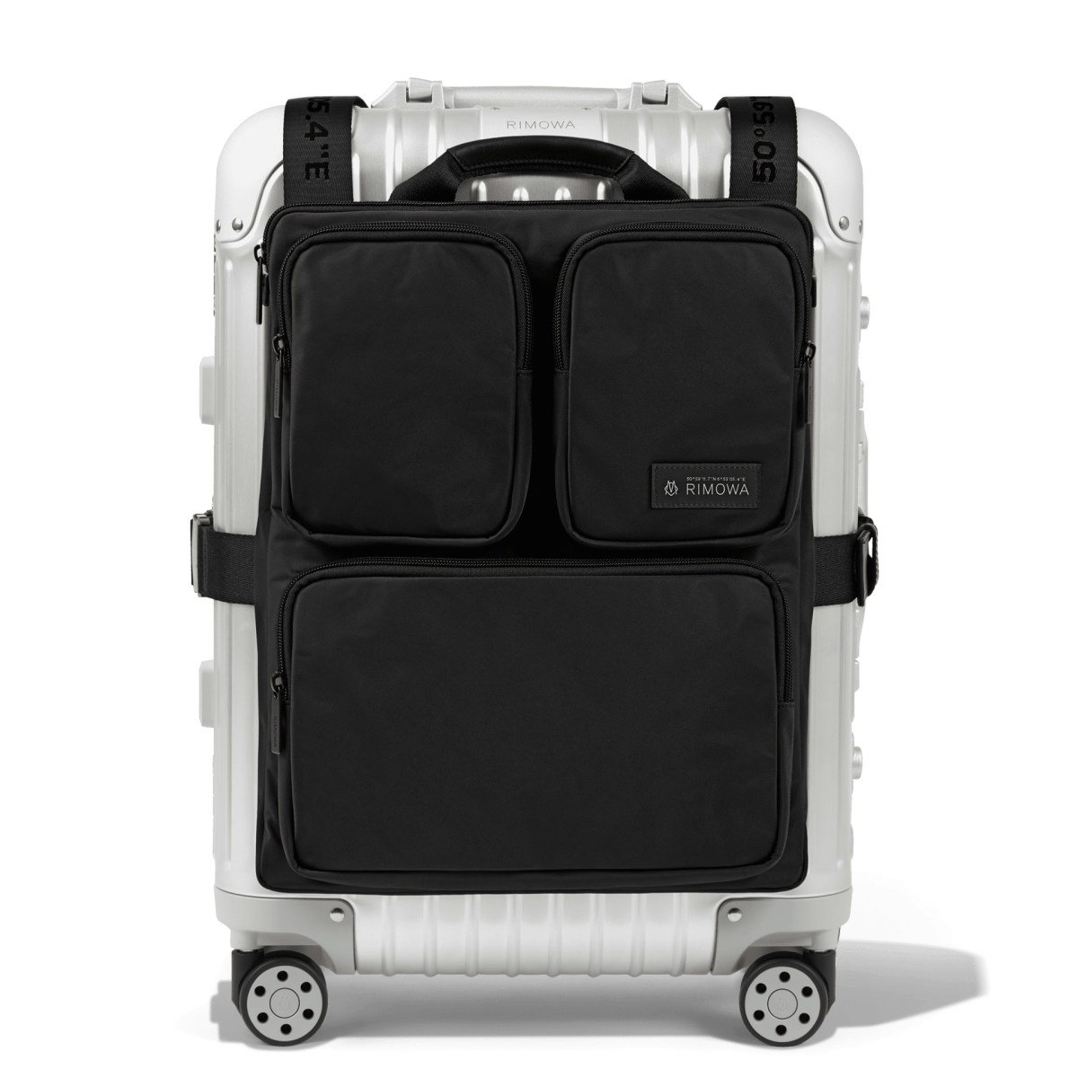 Fashion: Why We Can't Get Enough Of RIMOWA's Mini Suitcases