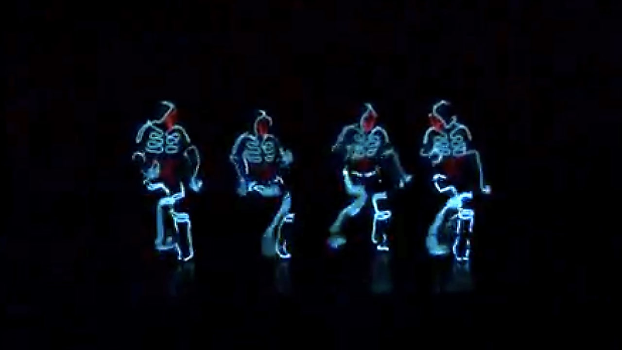 Wrecking Crew Orchestra Defies Dance Physics With “Tron” Suits