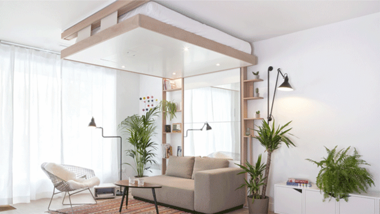 A SpaceSaving Bed That Lowers From The Ceiling