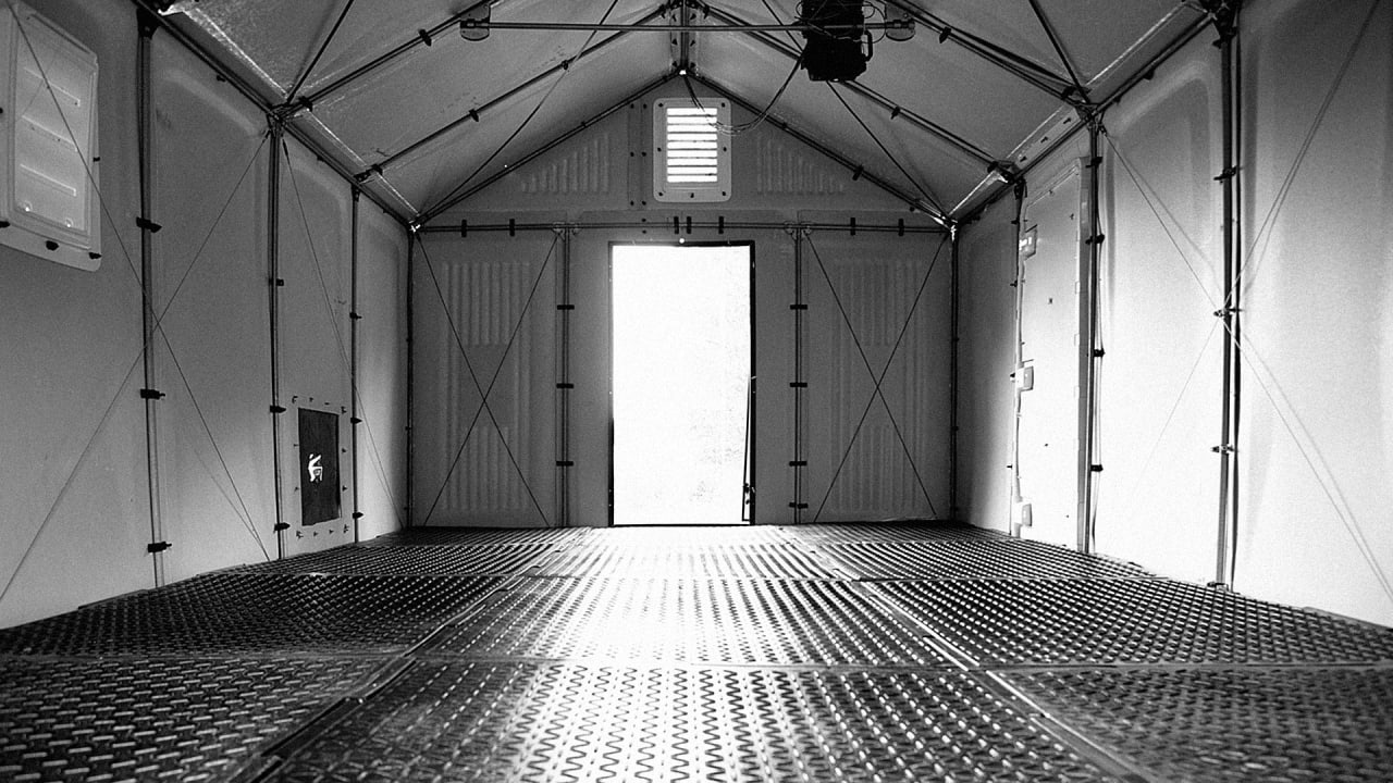 This “Emergency Floor” Turns Old Shipping Pallets Into Better Refugee Shelters