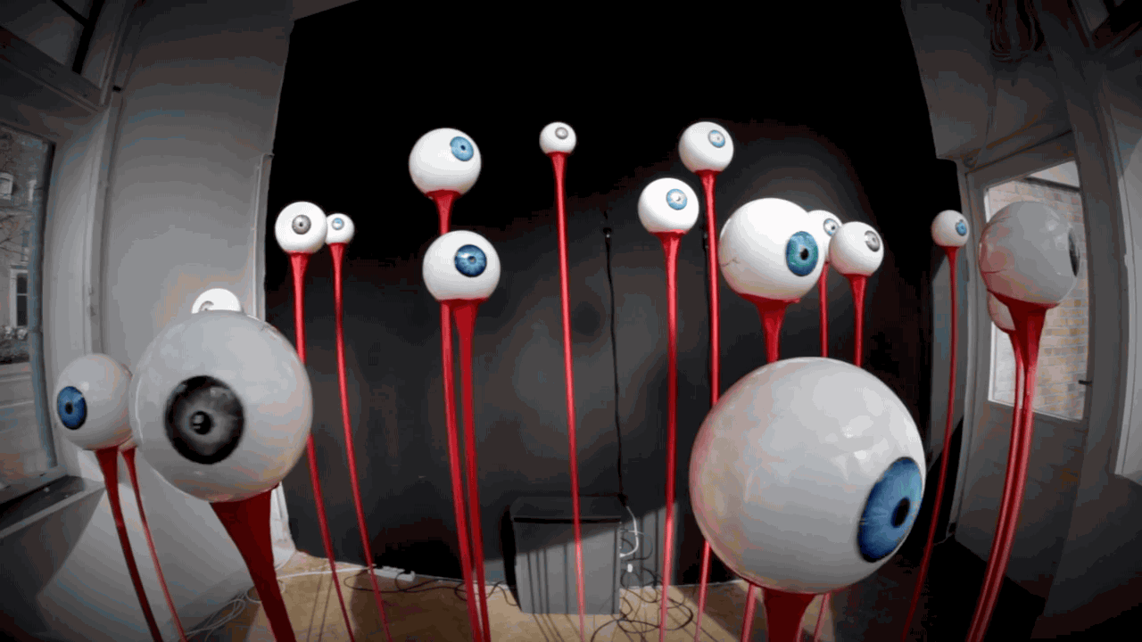 This Horrifying Wall Of Eyeballs Follows Your Every Move