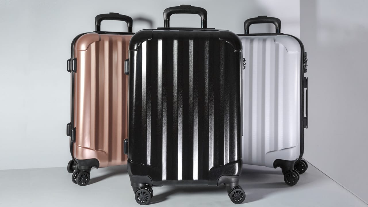 Away luggage vs hot sale genius pack
