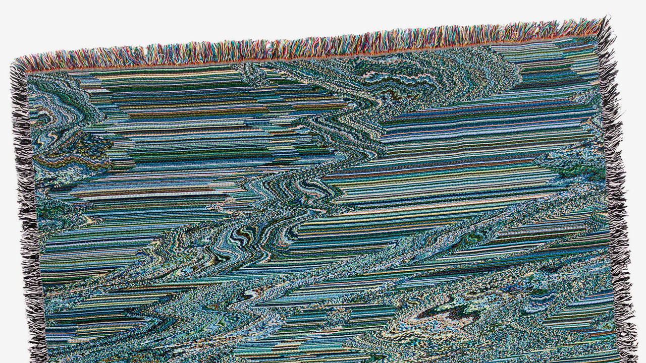 Glitch art blankets by Philip Stearns visualize COVID19