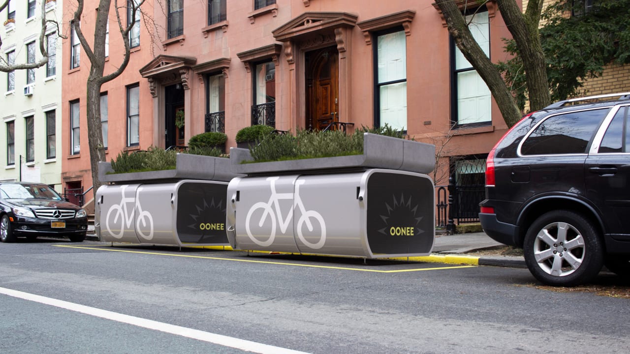 Oonee's new bike parking pods are designed to sit in a parking space