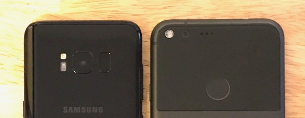 The Galaxy S8 (left) puts its fingerprint scanner to the right of the camera lens. On Google's Pixel XL, the scanner is well out of the way.