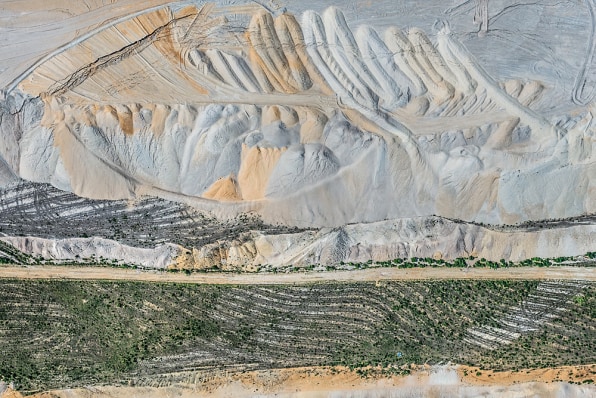 Premium Photo  Miners working deep inside a coal mine facility generative  ai