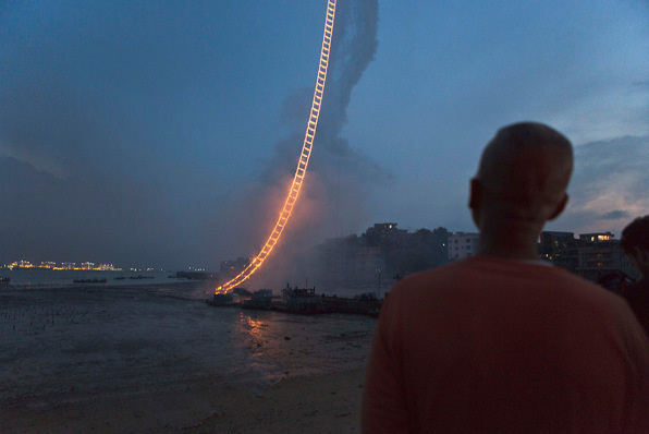 This Fiery Ladder Climbs Half A Kilometer Into The Night Sky