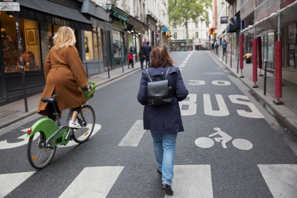 Paris, France - Circa 2019: Pedestrians walking near burned luxury